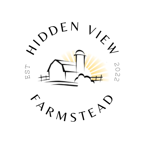 Logo of Hidden View Farmstead, featuring a stylized barn and silo with sun rays, established in 2022. Ideal for representing agricultural and farm-related content.